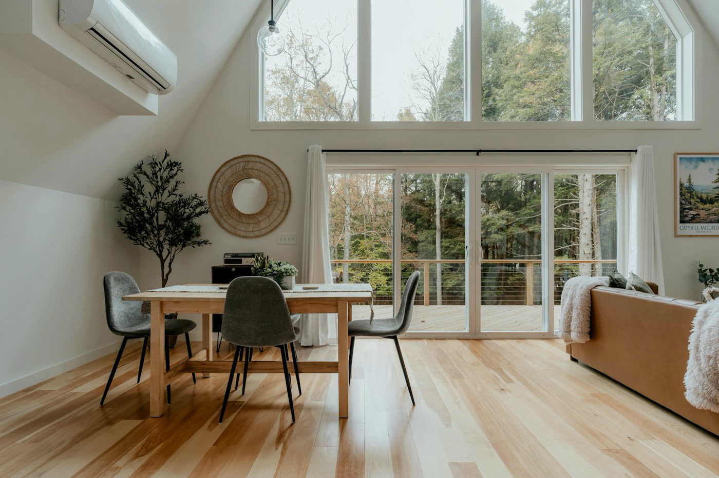 A bright, tidy home with a dining table and living area